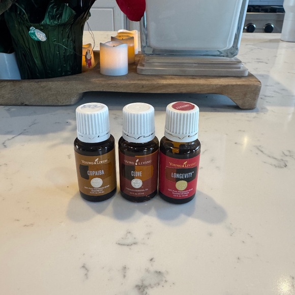 Young Living Other - YOUNG LIVING BUNDLE OF 3 SIZE 15 ML EACH BRAND NEW LONGEVITY, CLOVE, COPIABA